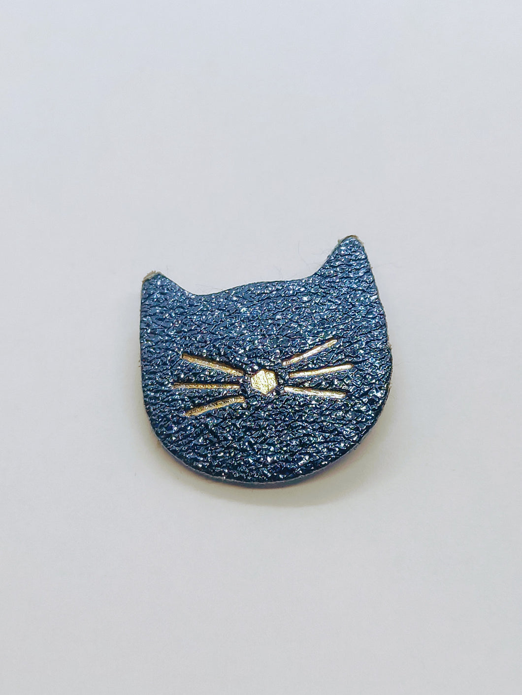 Broche Chat